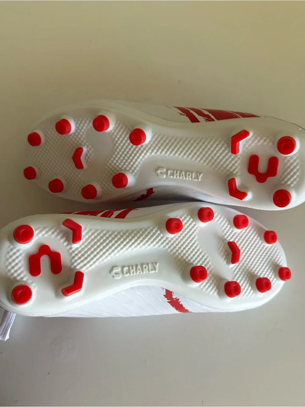 Charly Grasshopper Youth firm ground cleats Size:2.5